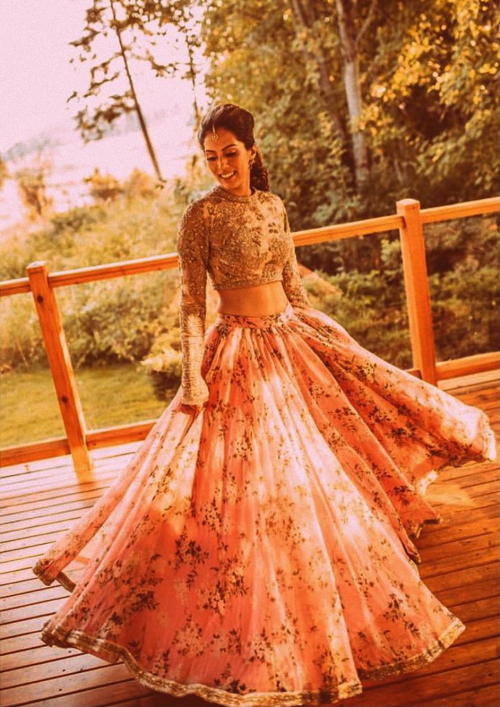Sabyasachi orange lehenga for bride